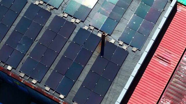 Orthographic aerial, industrial geometry, rooftop energy system and cargo units