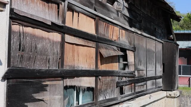 Weathered Wooden Exterior Wall of an Old Japanese House with Traditional Charred Cedar Siding