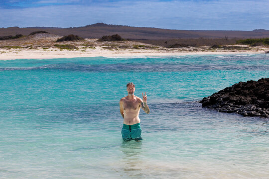Man in Galapagos beach