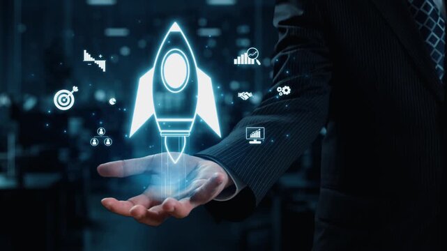 A businessman is depicted launching a digital rocket, symbolizing innovation and growth in a modern workspace. The image captures the essence of entrepreneurship and technology. Qubit