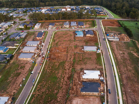 New houses under construction in suburb at edge of town in Hunter Valley Australia