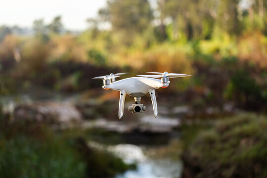 RPA drone hovering over waterway
