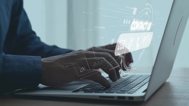 Hands Typing on Laptop with Digital Interface Overlays Illustrating Technology and Communication Concepts in Contemporary Workspace. Qubit.