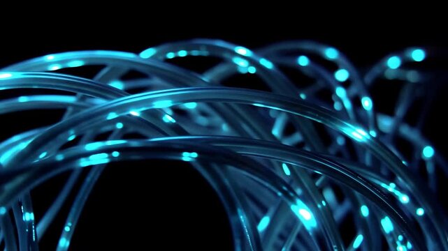 Abstract Blue Fiber Optic Cables Glowing with Light Particles.