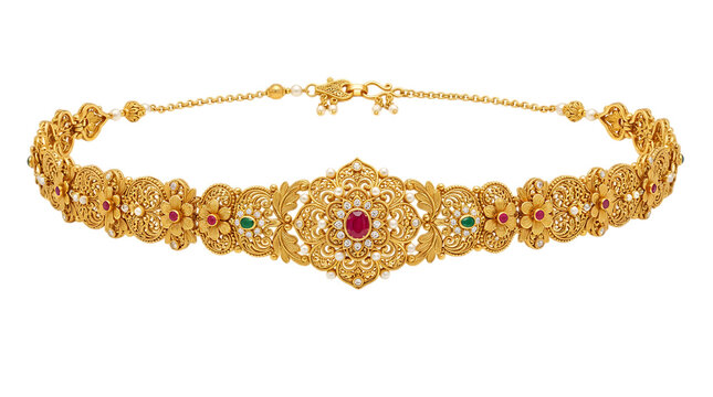 Beautiful traditional gold waist belt with ruby and emerald gemstones for wedding ceremony