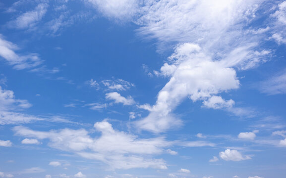 clear blue sky background,clouds with background, Blue sky background with tiny clouds. White fluffy clouds in the blue sky. 