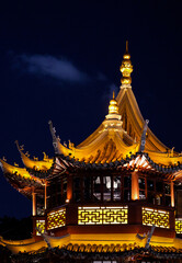 Fototapeta premium The night view of the pavilion in Yuyuan Garden, a tourist attraction in Shanghai