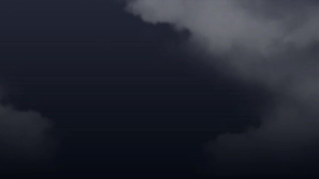 Storm clouds gather in a dark and heavy sky to evoke a sense of impending weather change.