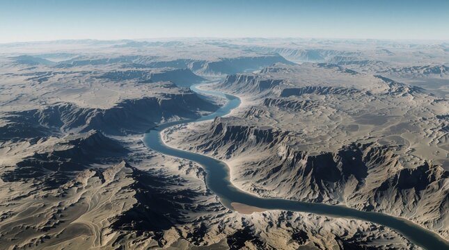 Aerial view of winding river flowing through barren desert canyon landscape. Vast arid terrain with rocky mountains under clear sky. Futuristic planet surface visualization created with digital tech.