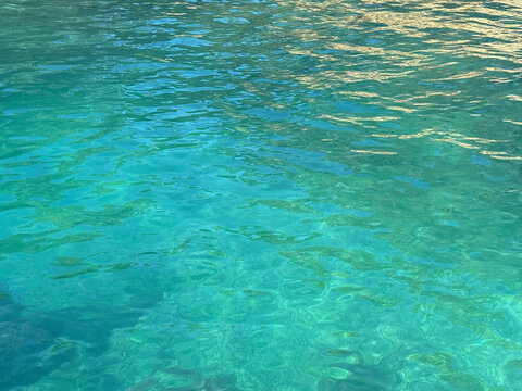 Blue calm sea water with ripples on surface