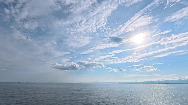 Scenic ocean landscape with dramatic cloudscape for freedom, exploration, and summer vacation project