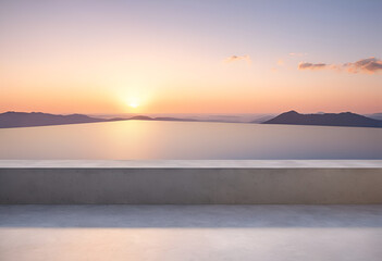 Fototapeta premium A bench sitting on a concrete ledge overlooking a lake, Front view of a smooth polished concrete architectural ledge against a soft gradient sunset sky