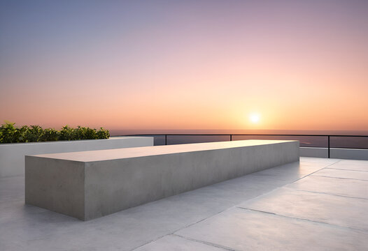A bench on a roof overlooking the ocean, Front view of a smooth polished concrete architectural ledge against a soft gradient sunset sky