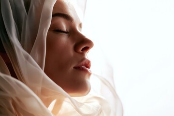 Fototapeta premium Ethereal angelic figure in flowing fabric