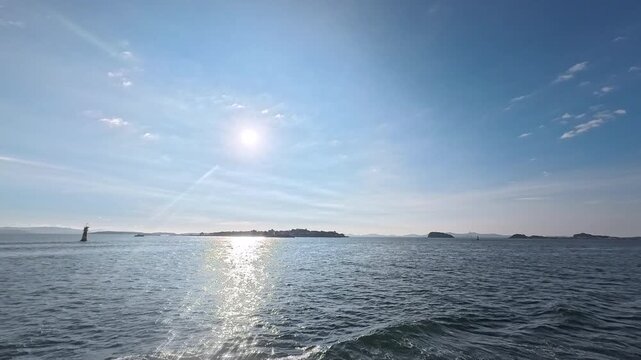 Coastal shipping lane background footage featuring sea mark and sun path for logistics and maritime safety