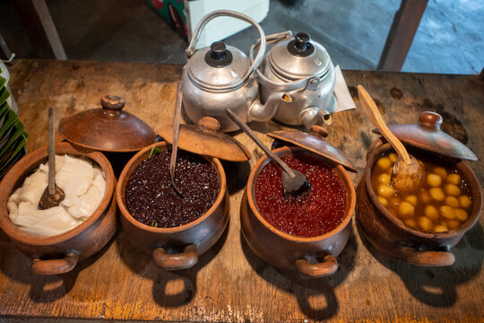 Jenang, delicious porridge made from wheat in a clay pan, traditional food from Yogyakarta, Indonesia