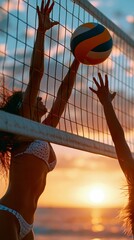Fototapeta premium Women playing beach volleyball at sunset reaching for the ball over the net with warm golden hour lighting.