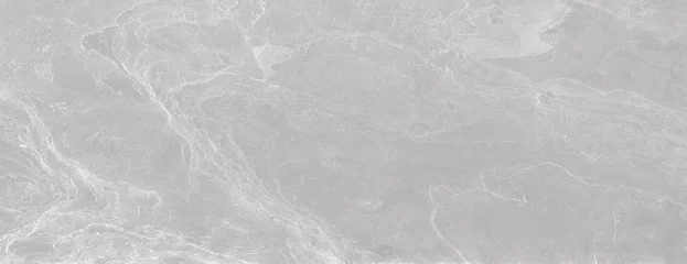 Light gray marble texture with soft white veining and natural stone details. Elegant surface for ceramic tiles, flooring, walls, and interior design. © Vidal