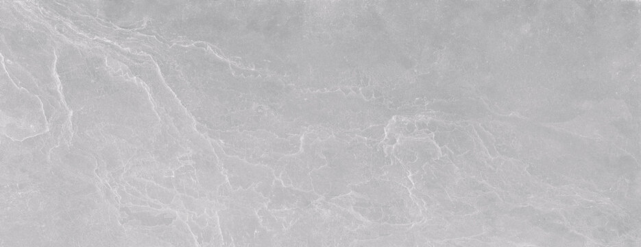 Light gray marble texture with soft white veining and natural stone details. Elegant surface for ceramic tiles, flooring, walls, and interior design.