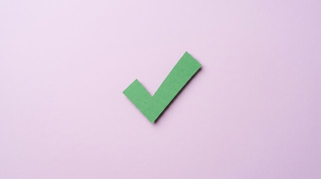 A green check mark symbol on a pink background