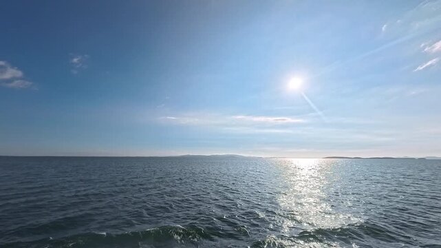 Cinematic real-time video of peaceful ocean horizon and island view for coastal tourism concept