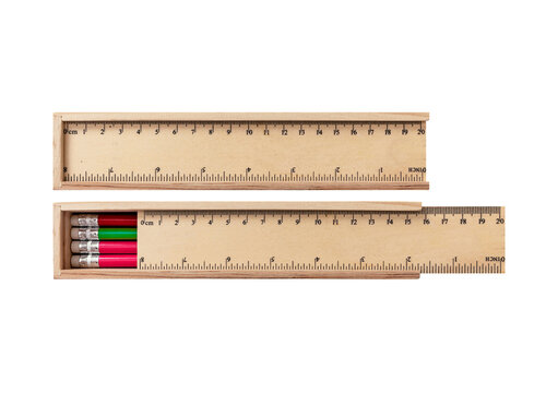Wooden sliding box with ruler top containing four new pencils.