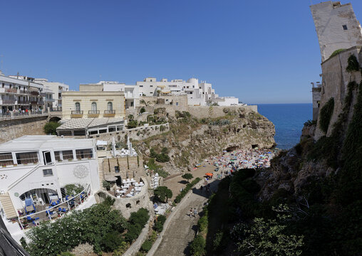 Polignano a mare coastline with cala monachile beach
