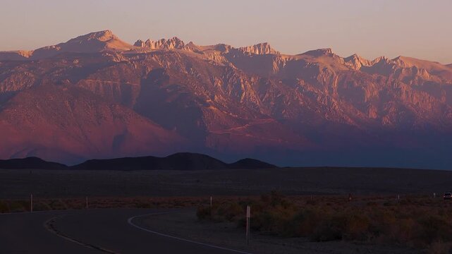 Wide shot of orange sunrise in death valley