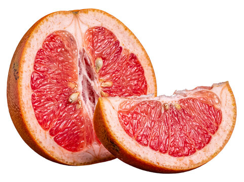 Fresh red grapefruit cut in half with an accompanying juicy wedge, showcasing its vibrant pulp and seeds.