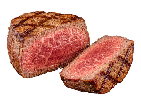 A thick, juicy grilled steak, split in two to display its perfect medium-rare interior, on transparent background.