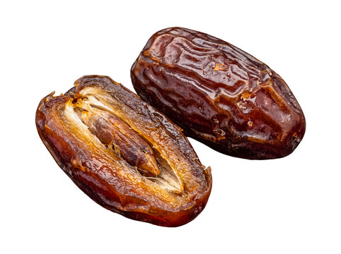 High-detail photograph of one whole dried date alongside a split date, prominently revealing its sweet.
