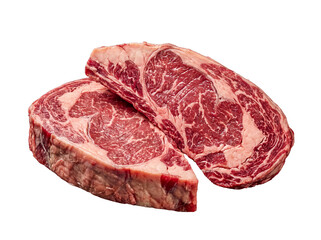 Fototapeta premium Two premium raw ribeye beef steaks, richly marbled for superior flavor and tenderness, isolated on transparent.