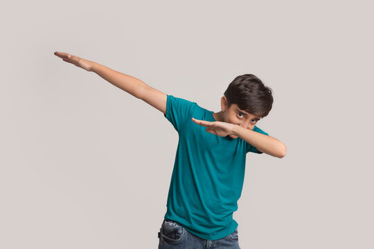 Portrait of a happy young boy dancing (Children)