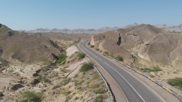 Aerial footage of the  Makran Coastal Highway is a 653-kilometer national highway in Pakistan running parallel to the Arabian Sea.