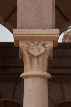 Elements of architectural decorations of buildings, columns and tops, gypsum molding, wall texture and stucco patterns. On the streets in Barcelona, public places.