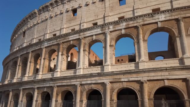 Colosseum Exterior in Rome under Clear Blue Sky