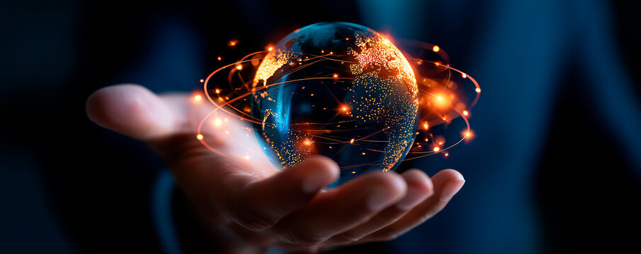 Businessman holding digital network globe for global marketing strategy and creative business development