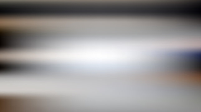 Abstract soft gray gradient background with subtle horizontal motion blur