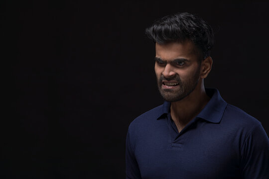 Portrait of a young man screaming 