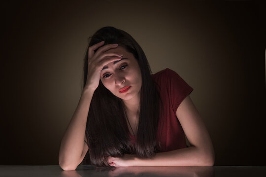 sad girl thinking at home 