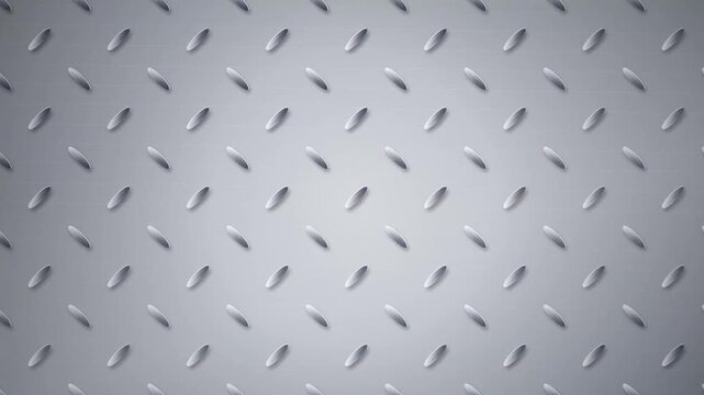 Industrial metal diamond plate texture background with a brushed silver finish