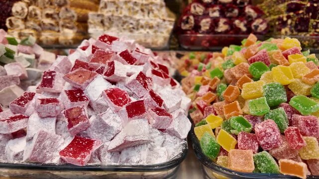 Close up view of colorful turkish delight candies at traditional oriental bazaar marketplace