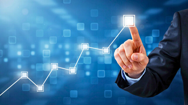 Businessman pointing at a growing financial graph chart interface for digital business growth