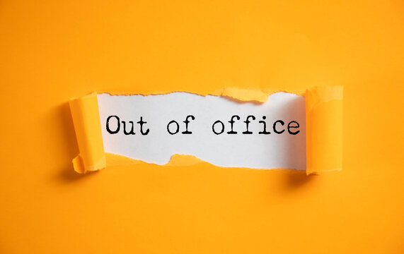 Out of office text on paper