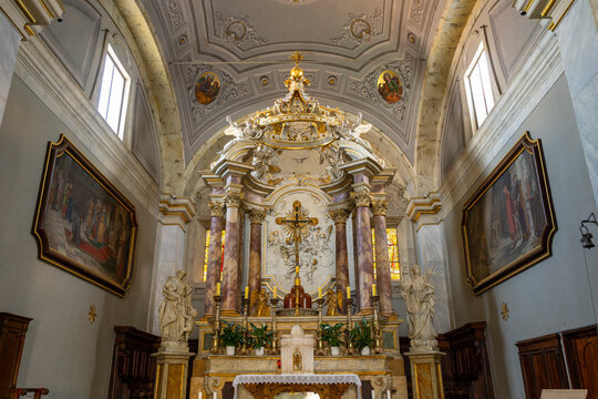 Ornate golden baroque altar in Pitigliano church, Tuscany