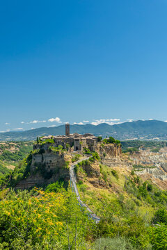 Civita di Bagnoregio medieval village on its hilltop with bridge