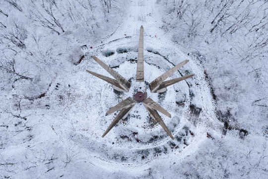 January 3, 2026, Kosmaj, Serbia: Straight-down drone view of the brutalist partisan memorial in deep winter snow