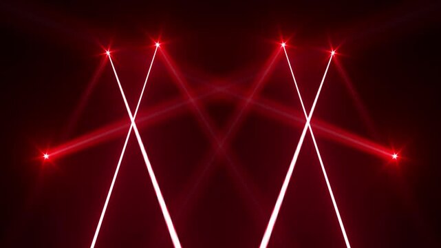 Spotlight beams red lighting shining with red laser beam on concert stage on background. VFX design, theatre stage, party, music event