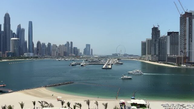 A scenic view of Dubai Marina and Dubai Harbour from Palm Jumeirah, Dubai.