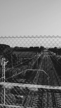 View of empty railway tracks, a feeling of loneliness, fear, and danger.